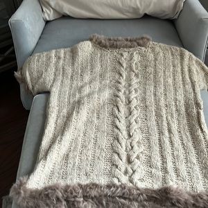 Hand made cashmere and fur.  Worn once.  Probably yarn and time is worn more